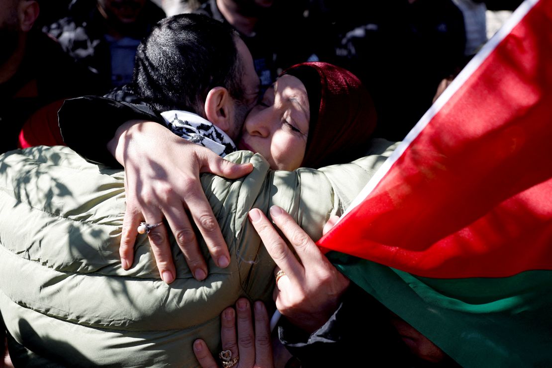 A freed Palestinian prisoner is greeted after being released, in Ramallah, in the Israeli-occupied West Bank, on Saturday.