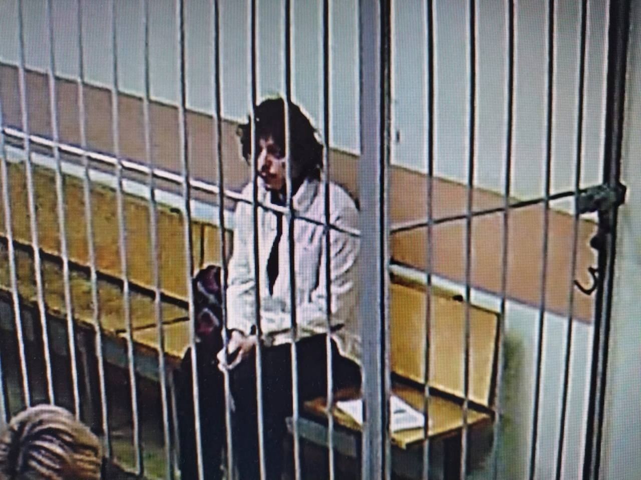 U.S. citizen, Kalob Wayne Byers, detained on suspicion of drug smuggling, appears on a screen in the courthouse during a video link to a court hearing in Moscow, Russia, on February 15.