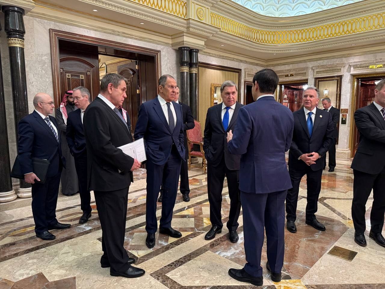 Russian Foreign Minister Sergei Lavrov and Russian President Vladimir Putin's foreign policy advisor Yuri Ushakov, center right, listen to U.S. Secretary of State Marco Rubio on the sidelines of the talks at Diriyah Palace in Riyadh, Saudi Arabia, on Tuesday.