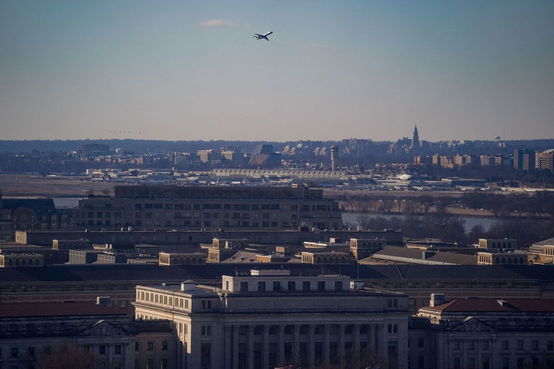 A plane flies over Washington, DC, on February 21.