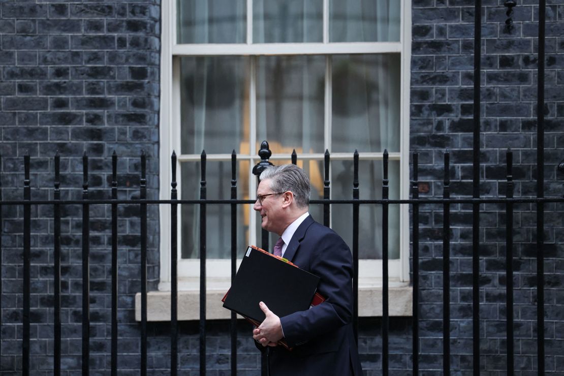 British Prime Minister Keir Starmer walks outside 10 Downing Street in London on Wednesday.