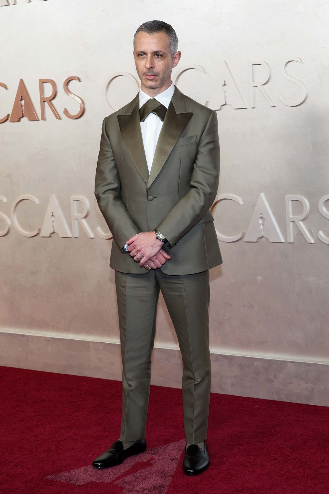 Best Supporting Actor nominee Jeremy Strong turned to Italian label Loro Piana for his olive green tuxedo.