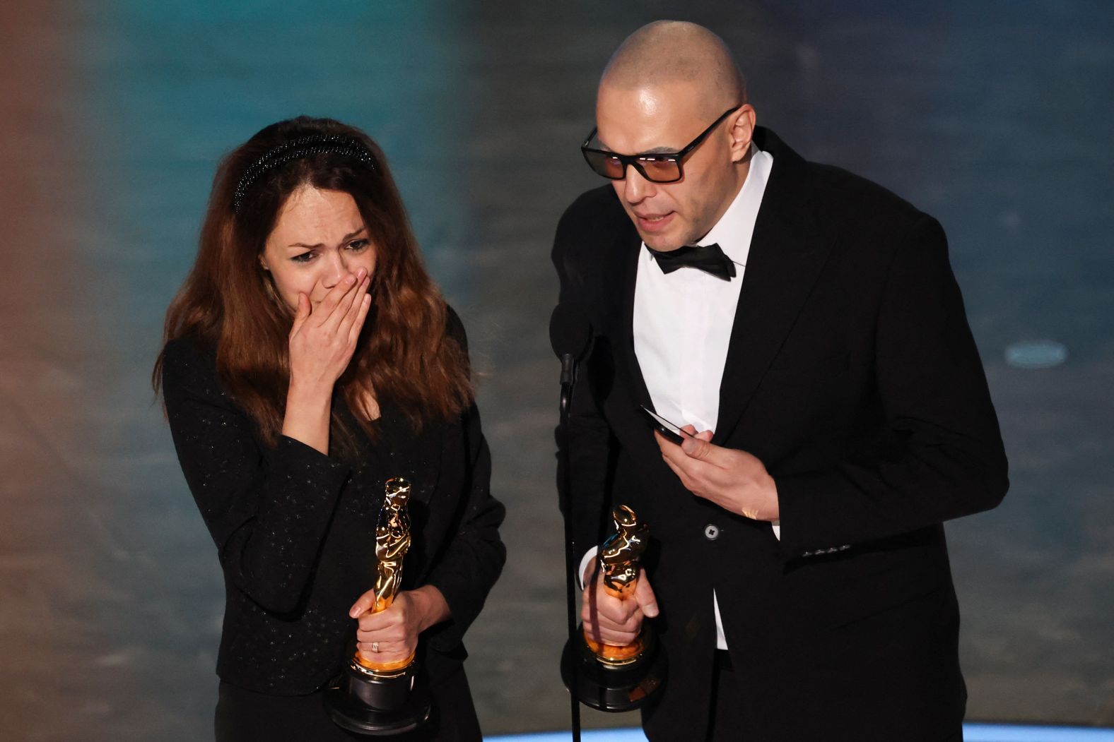 Shirin Sohani and Hossein Molayemi accept the Oscar for best animated short film ("In the Shadow of the Cypress").