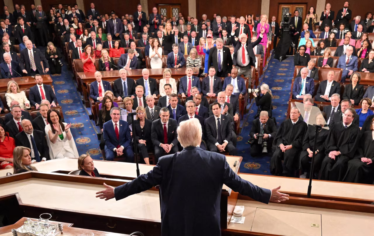 President Donald Trump gestures as he speaks to a joint session of Congress.