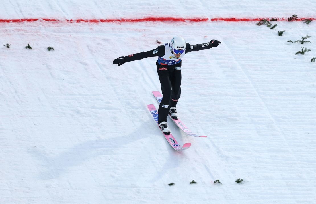 Forfang competes in the ski jumping team large hill event at the Nordic world championships, for which his suit was not found to have been manipulated.