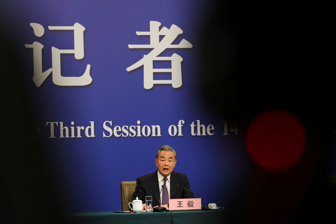 China's top diplomat Wang Yi speaks to media on the sidelines of the 