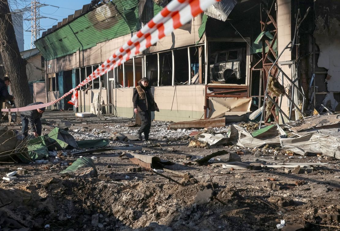 A resident walks at the site of a Russian drone strike, amid Russia's attack on Ukraine, in Odesa, Ukraine on March 8.