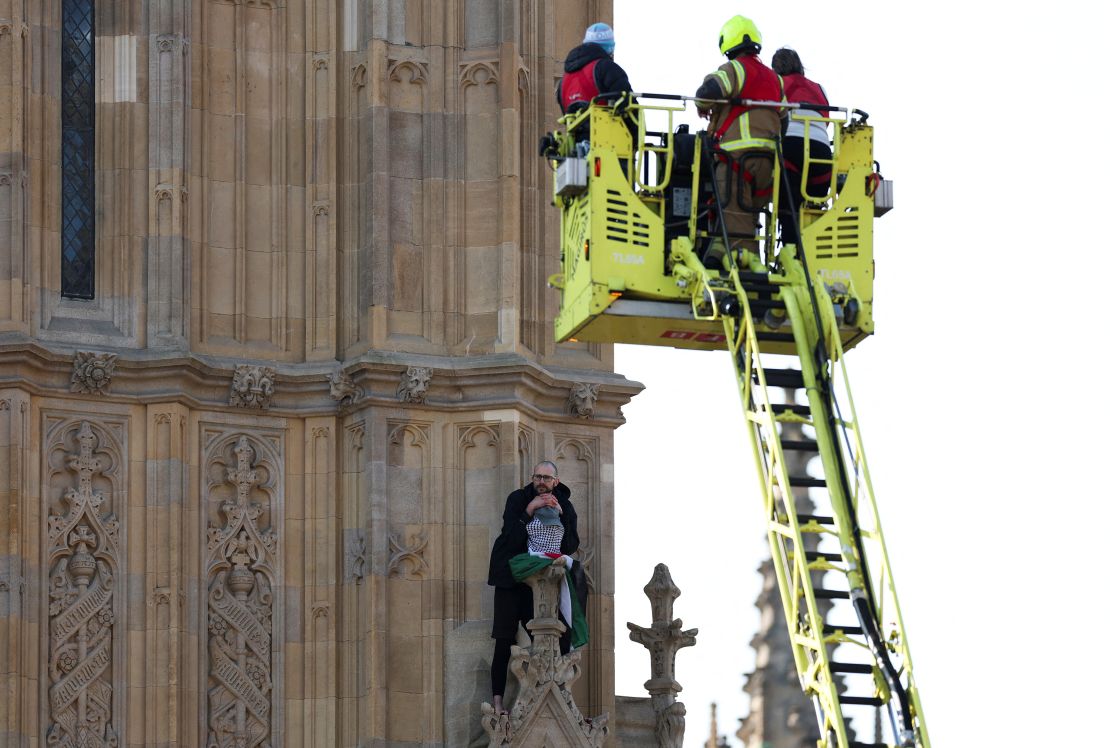 First responders try to reach a man on the Elizabeth Tower in London on March 8.