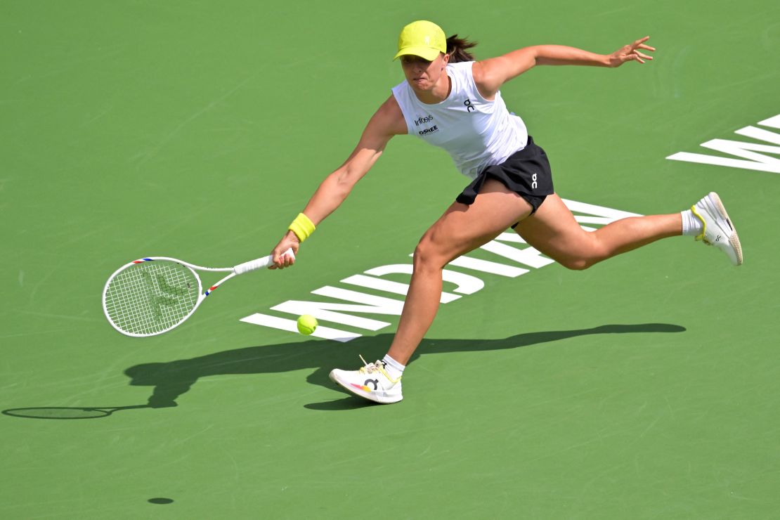 Świątek hits a shot as she defeated Karolína Muchová at Indian Wells.