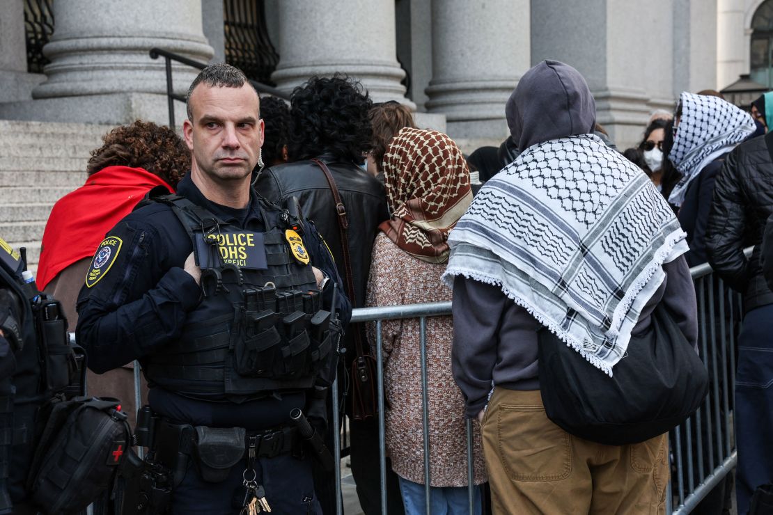 There was a police presence outside the courthouse Wednesday as supporters gathered ahead of Mahmoud's hearing.