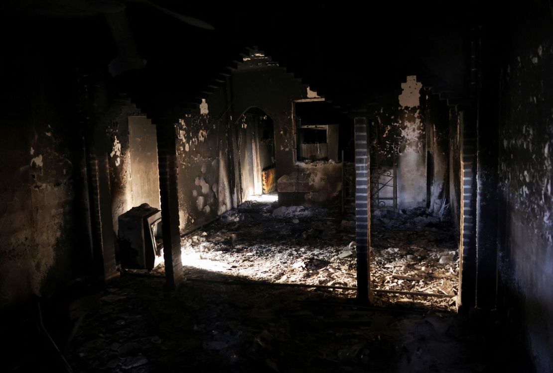 A destroyed home in Pine village lies in ruin in Latakia, Syria, on March 13.