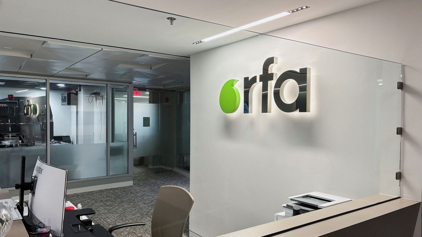 A logo of Radio Free Asia is displayed in its office, following the termination of funding for RFA, which broadcasts in nine Asian languages, a day after U.S. President Donald Trump signed an executive order gutting the government-funded media outlet's parent and six other federal agencies, in Washington, D.C., U.S. March 15, 2025.