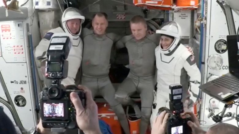 NASA astronaut Butch Wilmore, Roscosmos cosmonaut Aleksandr Gorbunov and NASA astronauts Nick Hague and Suni Williams pose for a photo at the hatch a SpaceX Crew Dragon capsule before closing the hatch in preparation for undocking from the ISS to begin their return to Earth March 17, 2025 in this still image taken from video.   NASA/Handout via REUTERS   THIS IMAGE HAS BEEN SUPPLIED BY A THIRD PARTY   REFILE - CORRECTING "FROM A SPACEX CREW DRAGON CAPSULE" TO "AT THE HATCH OF A SPACEX CREW DRAGON CAPSULE".
