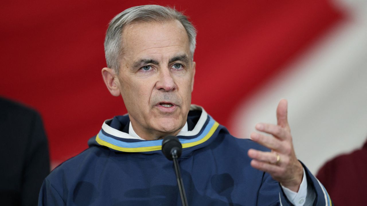 Canada's Prime Minister Mark Carney gives a statement following a meeting with Nunavut Premier P.J. Akeeagok, at a Forward Operating Location in Iqaluit, Nunavut, Canada, March 18, 2025.  REUTERS/Carlos Osorio