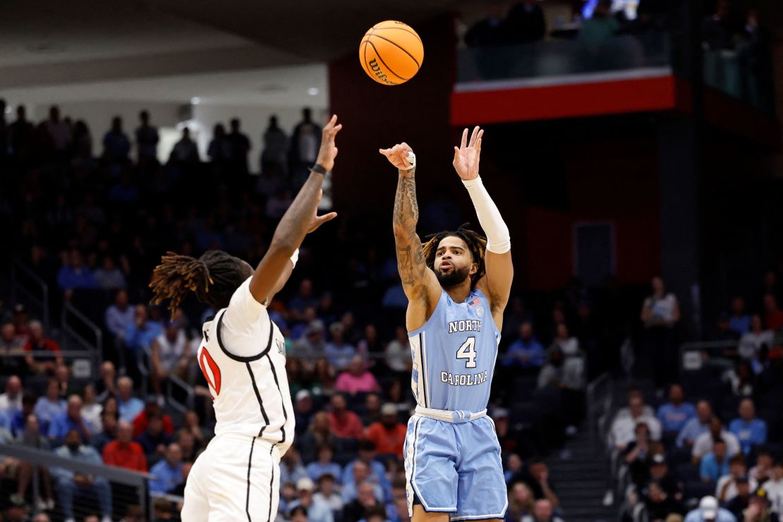 North Carolina Tar Heels guard RJ Davis shoots over San Diego State Aztecs guard BJ Davis during the First Four game.