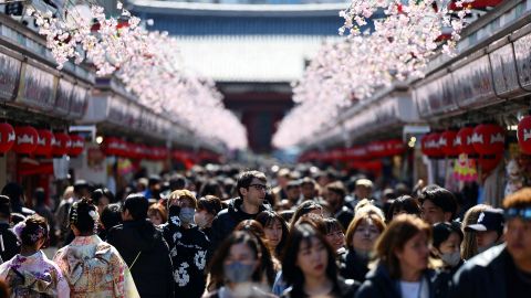 Visitors walk along Nakamise-dori street as they visit Sensoji temple at Asakusa district, a popular sightseeing spot in Tokyo, Japan March 10, 2025.