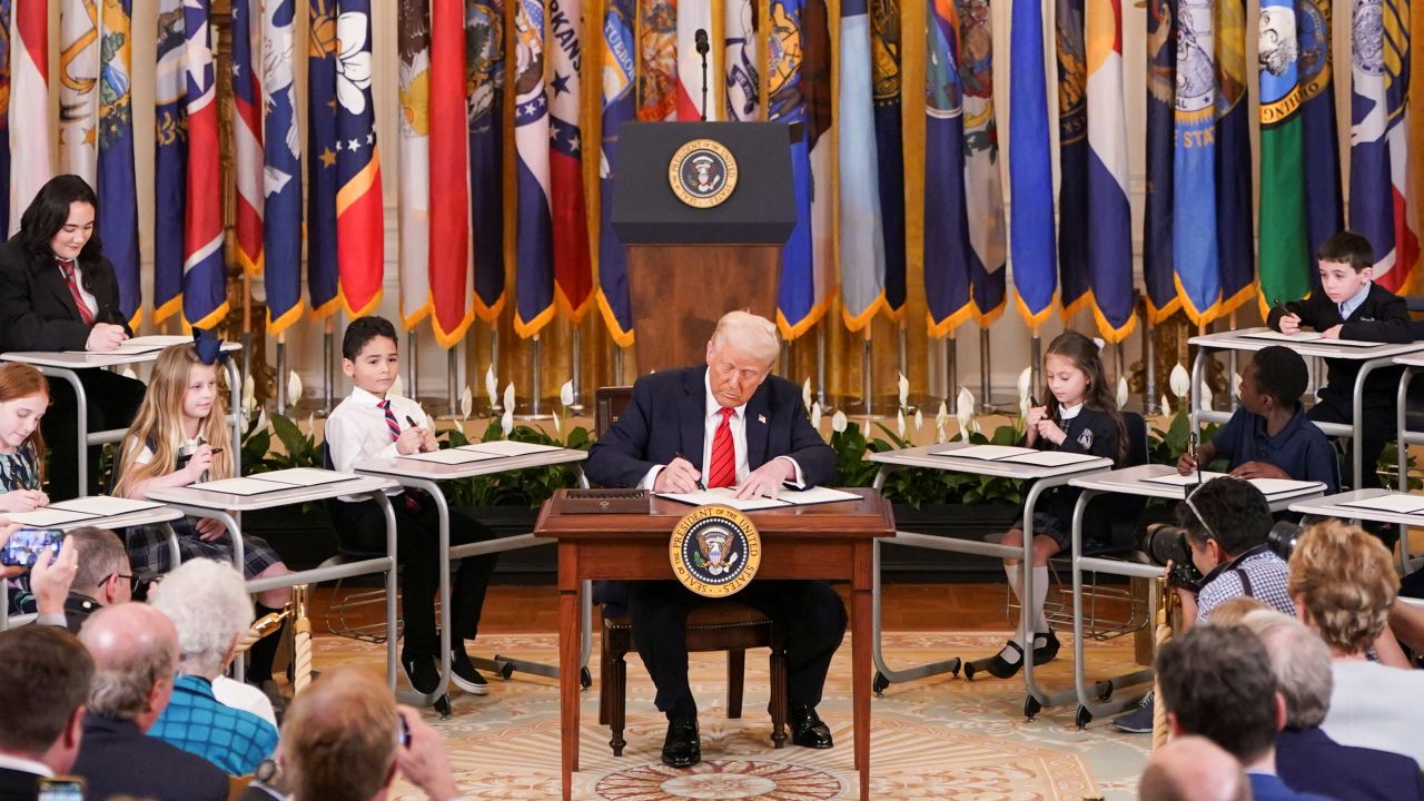 President Donald Trump signs an executive order to shut down the Department of Education, during an event in the East Room at the White House in Washington, DC, on Thursday.