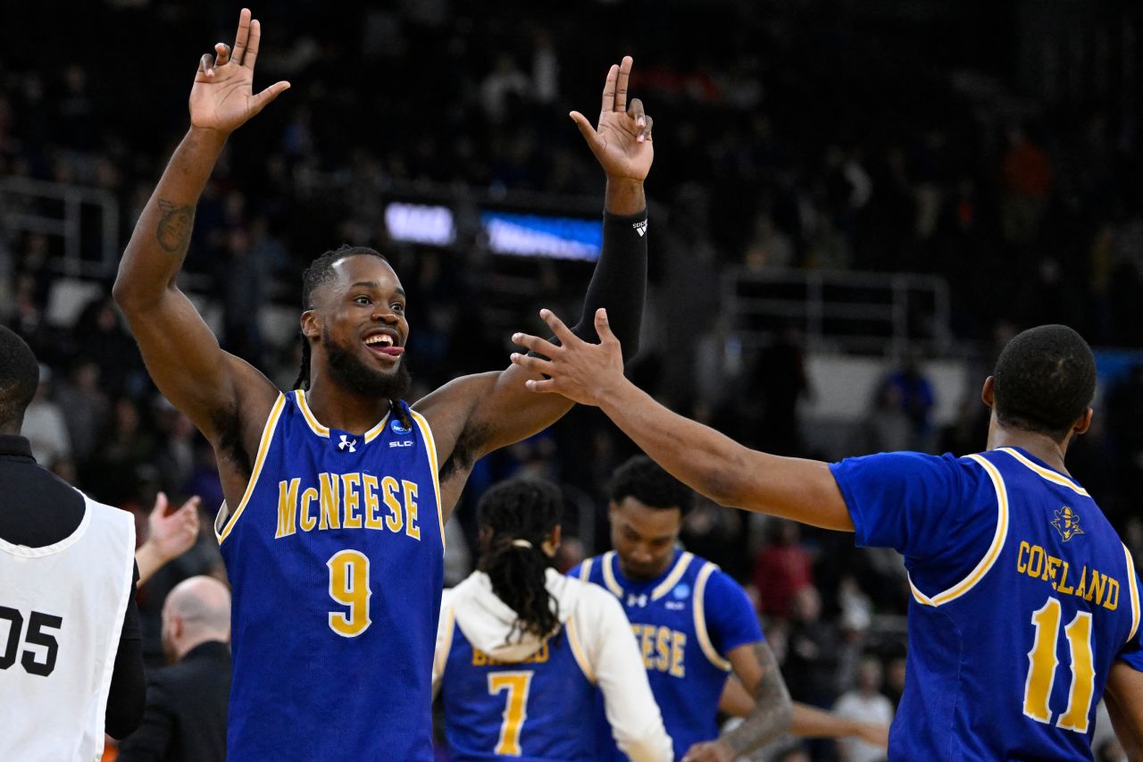 McNeese State forward Bryant Selebangue celebrates with guard Quadir Copeland after defeating the Clemson Tigers in Providence, Rhode Island on Thursday.