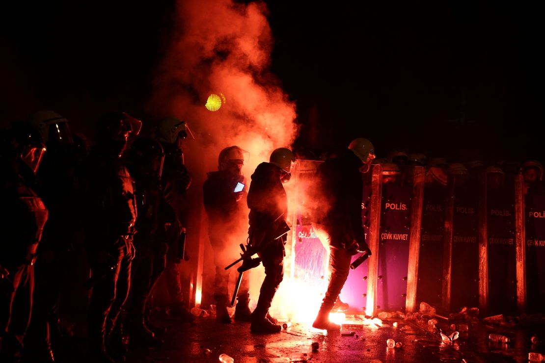 Police officers stand guard during a protest by students against the detention of Istanbul Mayor Ekrem Imamoglu, in Istanbul, Turkey, March 21, 2025.