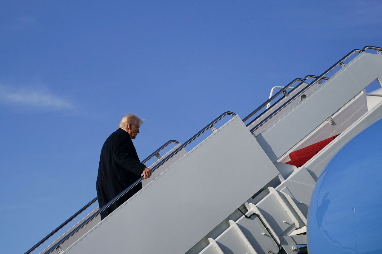 President Donald Trump boards Air Force One at Joint Base Andrews, Maryland, as he departs for New Jersey on Friday.