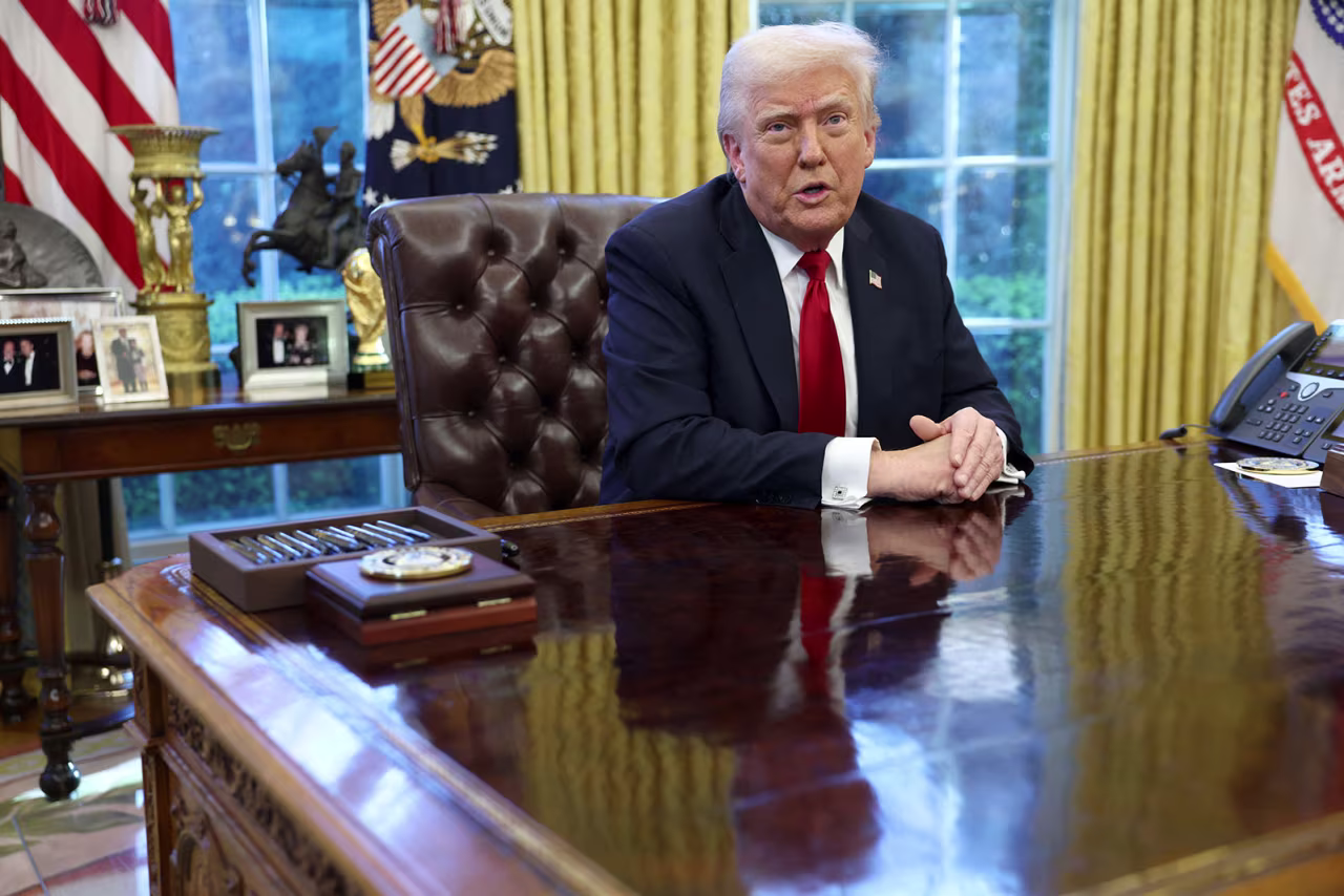 President Donald Trump speaks to the media in the Oval Office at the White House in Washington, DC, on Wednesday.