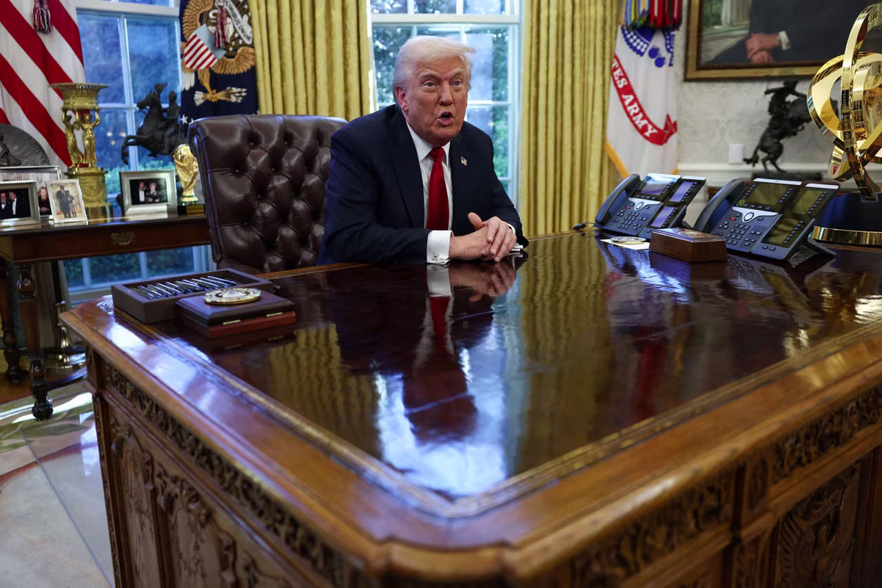 President Donald Trump speaks to the media in the Oval Office at the White House in Washington, DC, on Wednesday.