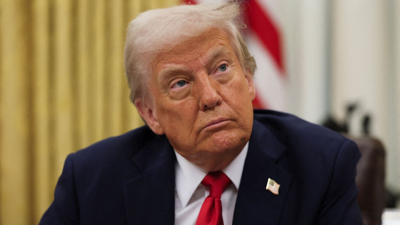U.S. President Donald Trump prepates to sign an executive order related to the U.S. live entertainment ticketing industry in the Oval Office at the White House in Washington, D.C., March 31, 2025.   REUTERS/Leah Millis