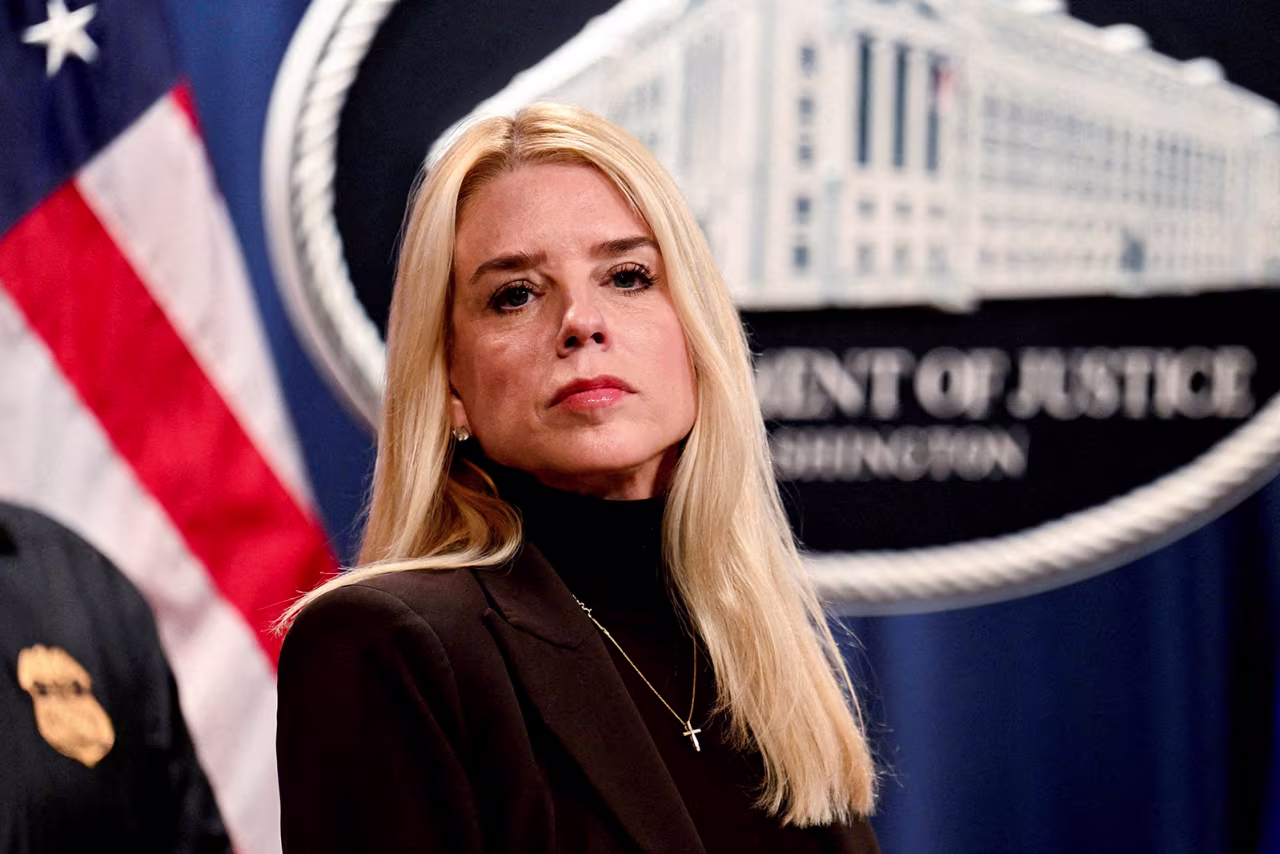 US Attorney General Pam Bondi looks on during her first press conference at the Justice Department in Washington, DC, on February 12.