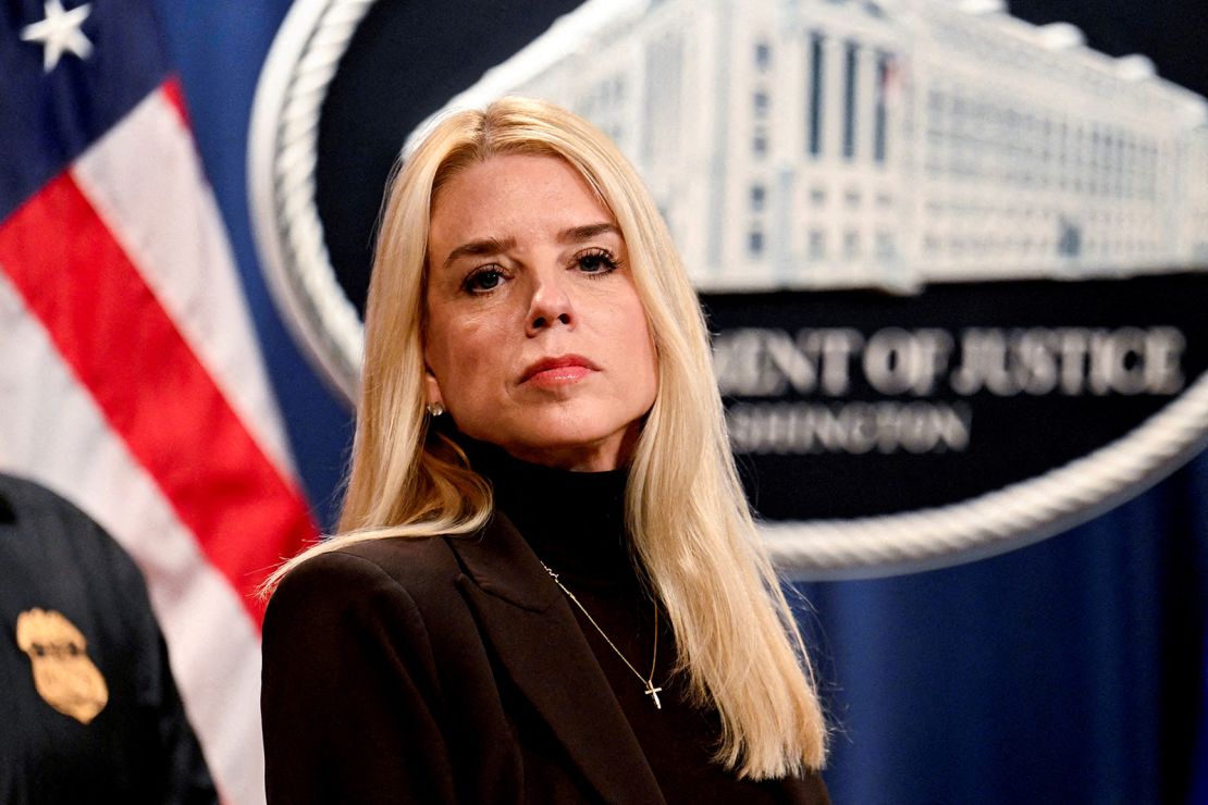 US Attorney General Pam Bondi looks on during her first press conference at the Justice Department in Washington, DC, on February 12.