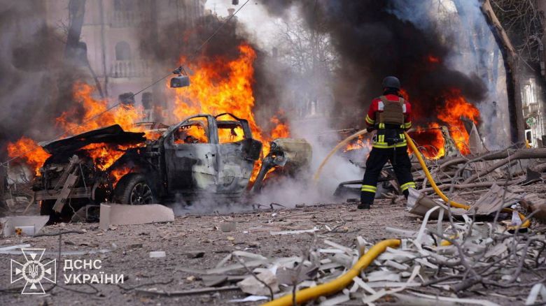 Firefighters work at the site of a Russian missile strike, amid Russia's attack on Ukraine, in central Sumy, Ukraine April 13, 2025. .