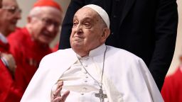 Pope Francis greets cardinals as he unexpectedly appears during the Palm Sunday Mass in Saint Peter's Square at the Vatican, April 13, 2025. REUTERS/Yara Nardi