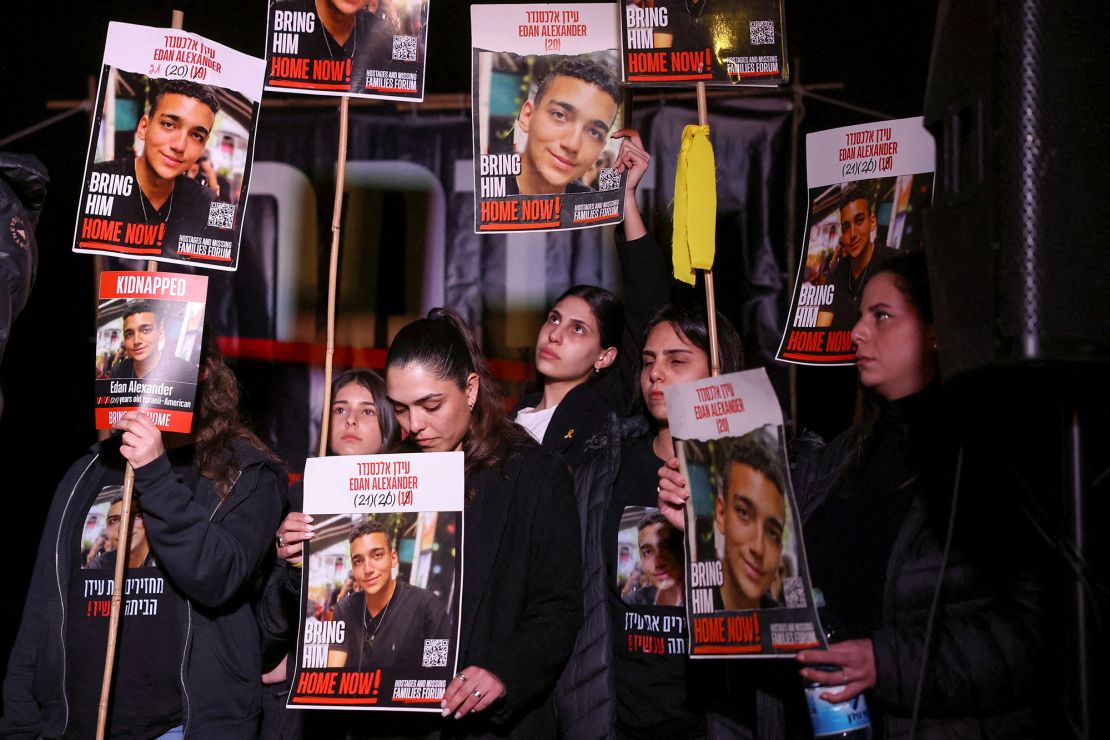 People carry posters with pictures of Edan Alexander, kidnapped during the October 7, 2023 attack on Israel by Hamas, as supporters of Israeli hostages take part in a protest in Jerusalem on Sunday.