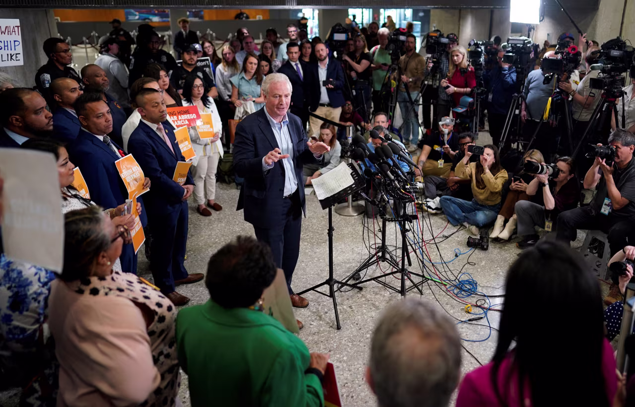 Sen. Chris Van Hollen holds a press conference at Dulles International Airport in Sterling, Virginia, on Friday, after returning from a visit to El Salvador to see Kilmar Abrego Garcia.