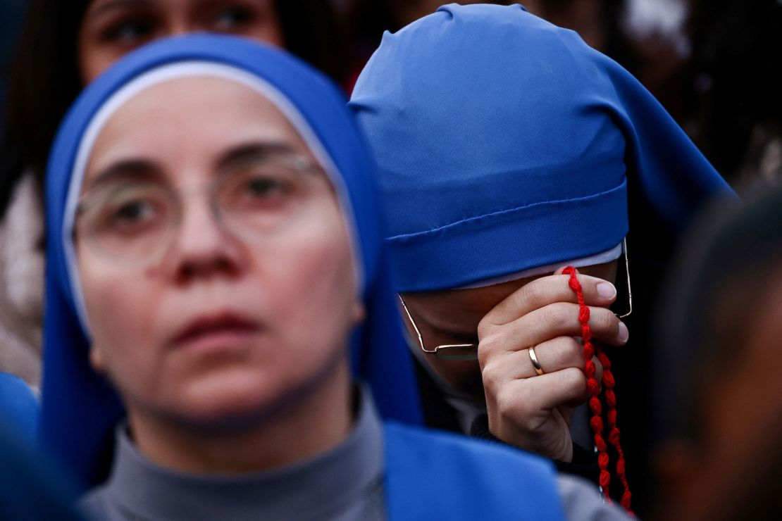 Nuns attend a rosary prayer for Pope Francis, in St. Peter's Square, at the Vatican, on April 21. The 88-year-old pontiff died of a stroke and heart failure on Easter Monday.