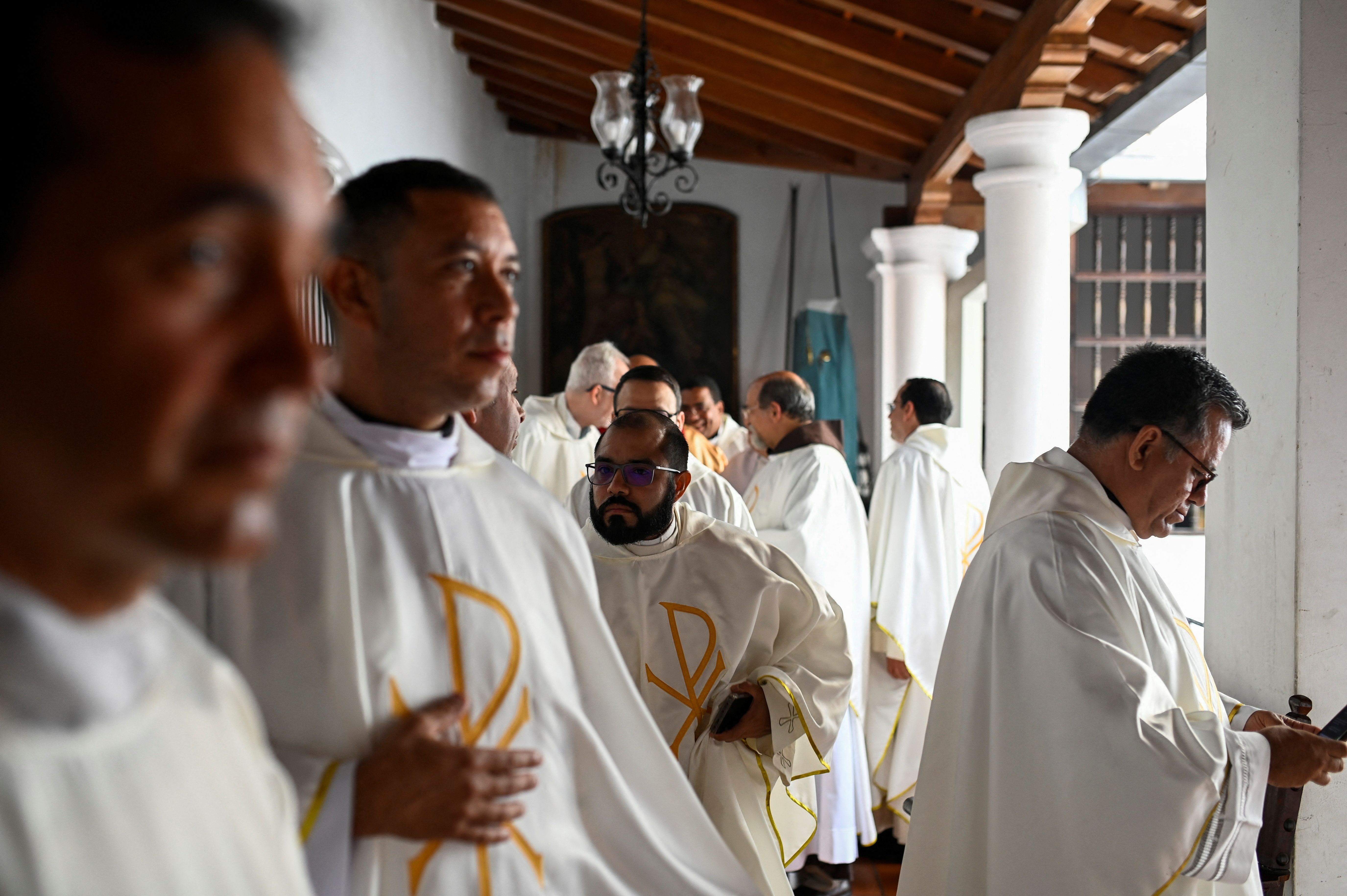 Church members get ready for a Mass at a cathedral in Caracas, Venezuela.