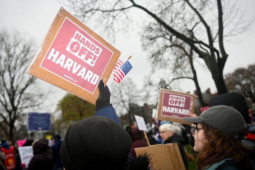 Demonstrators rally April 12 on Cambridge Common in Massachusetts.