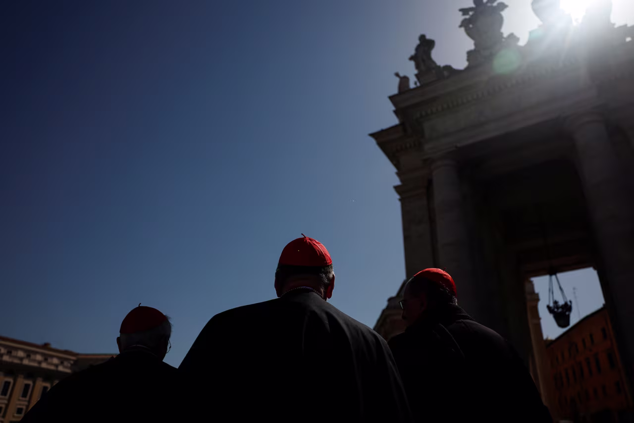 Cardinals walk at St Peter's Square today.