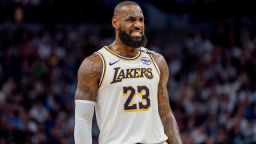 Los Angeles Lakers forward LeBron James talks with a referee in the third quarter against the Minnesota Timberwolves during game four of first round for the 2025 NBA Playoffs at Target Center, Minneapolis, Minnesota, on April 27, 2025.