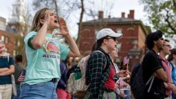 Harvard student Kaija Hornburg yells "shame" at a "Harvard Stands United Rally" organized by Students for Freedom at Harvard University in Cambridge, Massachusetts, U.S. April 29, 2025.  REUTERS/Taylor Coester