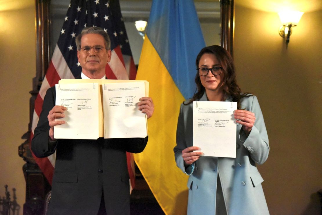 US Treasury Secretary Scott Bessent and Ukrainian First Deputy Prime Minister Yulia Svyrydenko pose after signing the minerals deal in Washington on April 30, 2025.