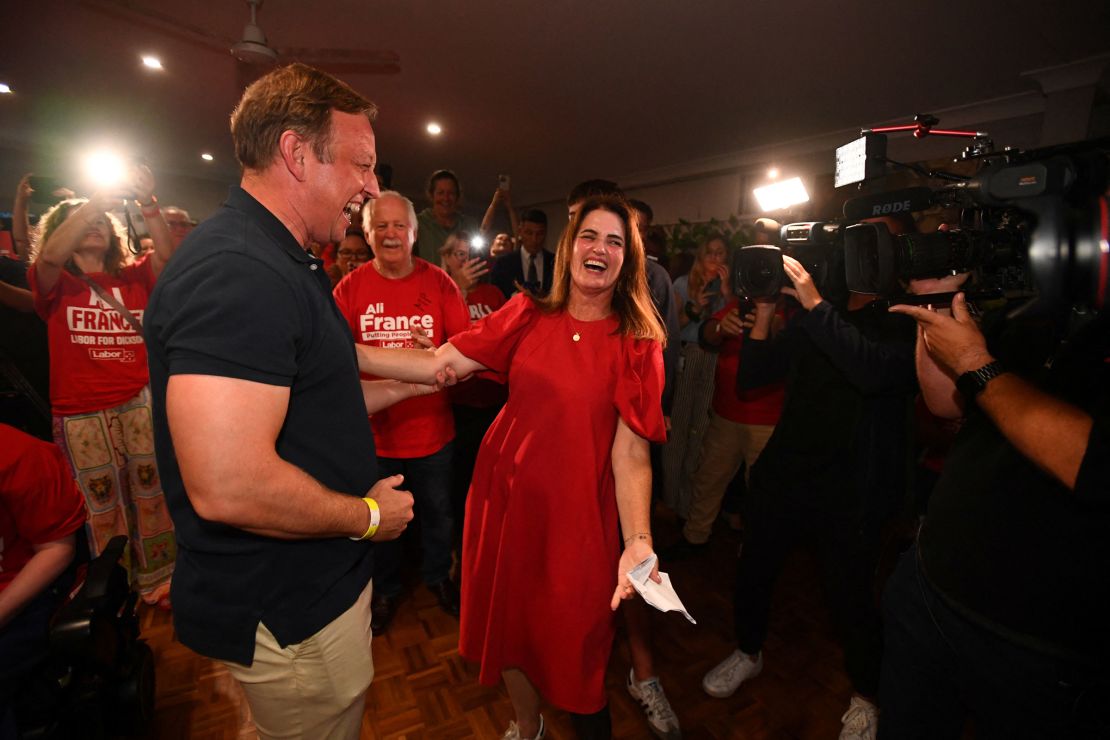 Ali France of the Labor Party celebrates with former Queensland Premier Steven Miles and supporters at Kallangur Bowls club in Kallangur, Australia, on Saturday, May 3, 2025.