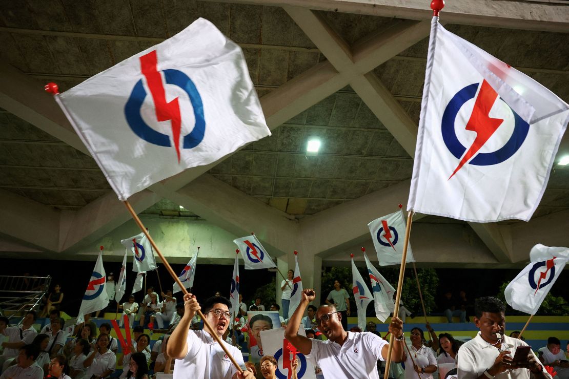 People's Action Party supporters gather at an assembly area to wait for results of the general election in Singapore, May 3, 2025. REUTERS/Edgar Su     TPX IMAGES OF THE DAY     