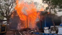 A fire burns following an aerial bombardment at a hospital runs by Médecins Sans Frontières in the northern town of Old Fangak in South Sudan.
