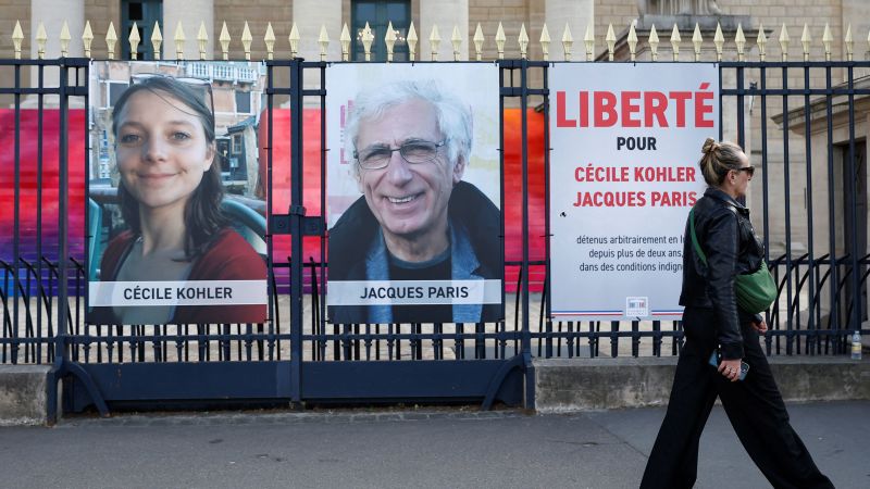 Iranian court gives lengthy jail sentences to two French citizens on spying charges