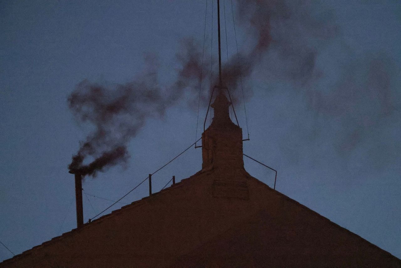 Black smoke rises from the chimney on the Sistine Chapel, indicating no decision has been made to elect a new pope on Wednesday.