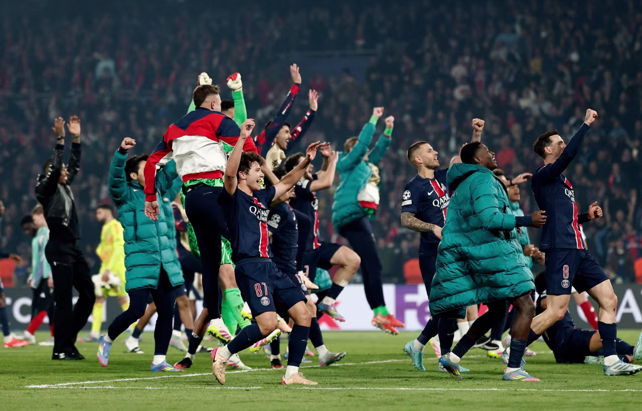 The Paris Saint-Germain squad celebrates.