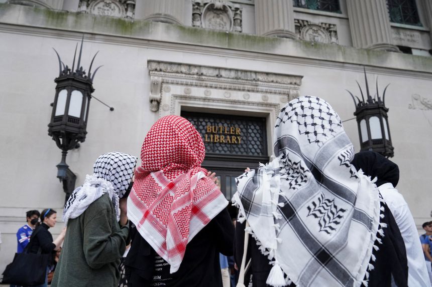 People take part in a pro-Palestinian protest at Butler Library on the campus of Columbia University in New York, Wednesday.