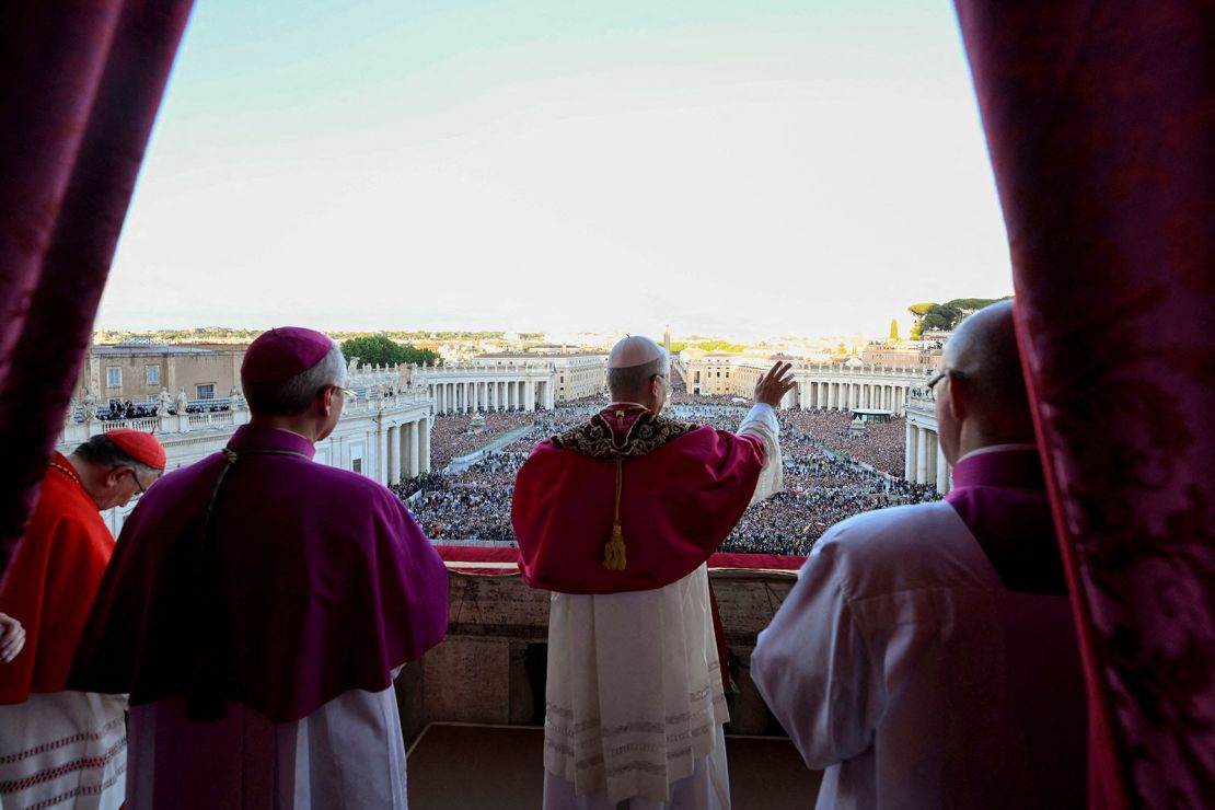 The newly elected Pope Leo waves from the balcony of St. Peter's Basilica on Thursday.