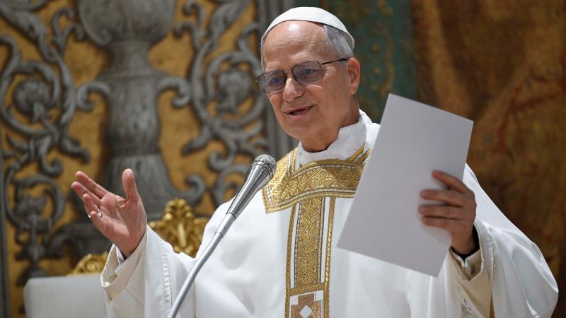 Pope Leo asks cardinals to make themselves ‘small’ in first mass as pontiff as cardinals deny he’s a ‘counterweight’ to Trump