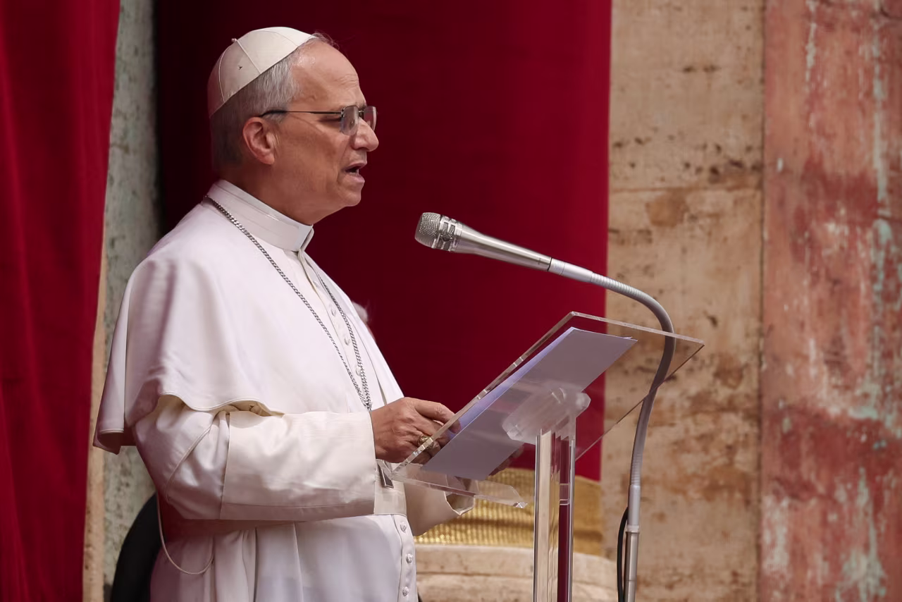 Pope Leo XIV delivers his first Sunday blessing at St. Peter's Basilica, at the Vatican, on May 11.